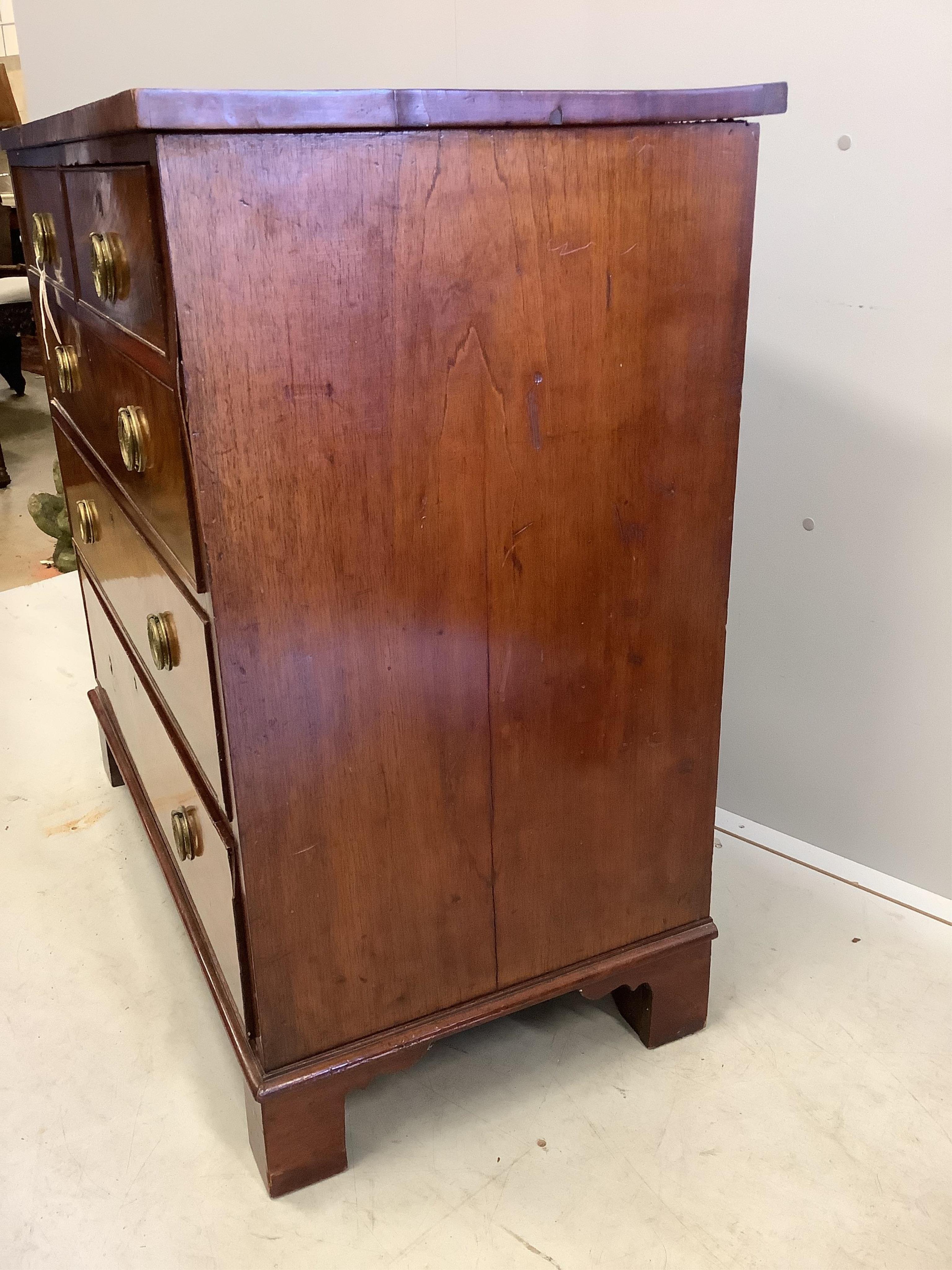 A Georgian mahogany straight front chest of two short and three long drawers, brass ring handles on square bracket feet, width 94cm, depth 50cm, height 92cm